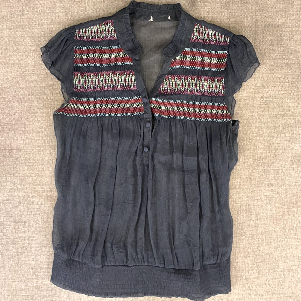 Anthropologie brand women’s blouse, size medium. Blue with colorful embroidery.